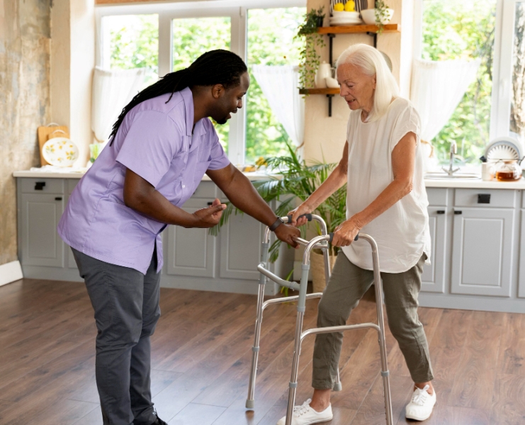 male-social-worker-taking-care-old-woman