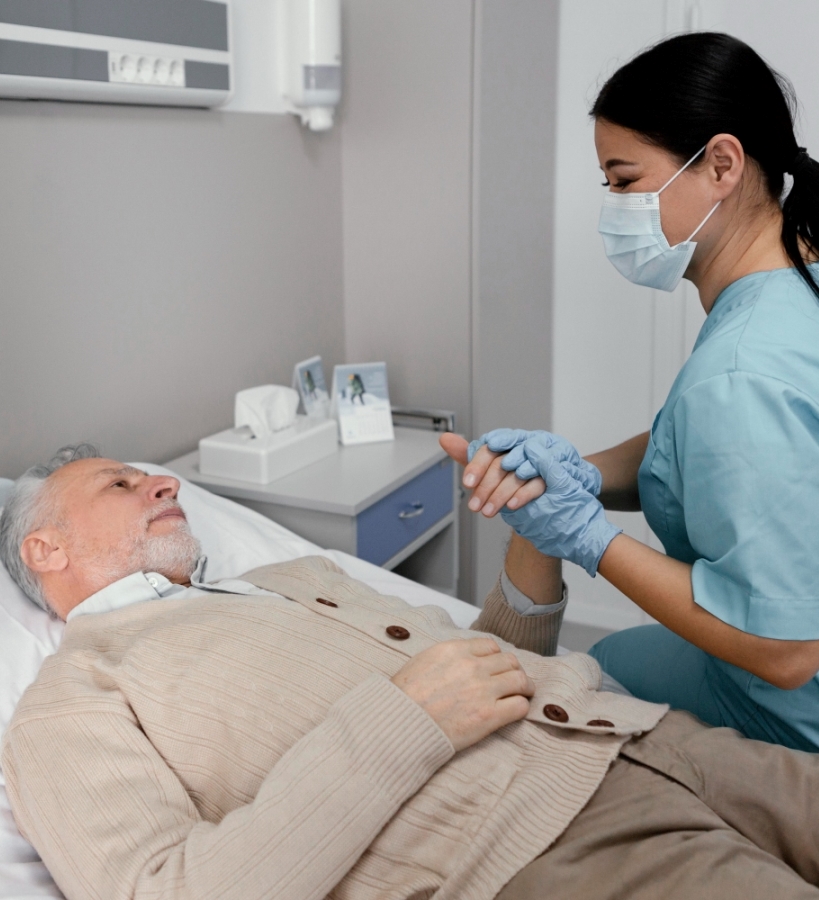 medium-shot-nurse-holding-patient-s-hand