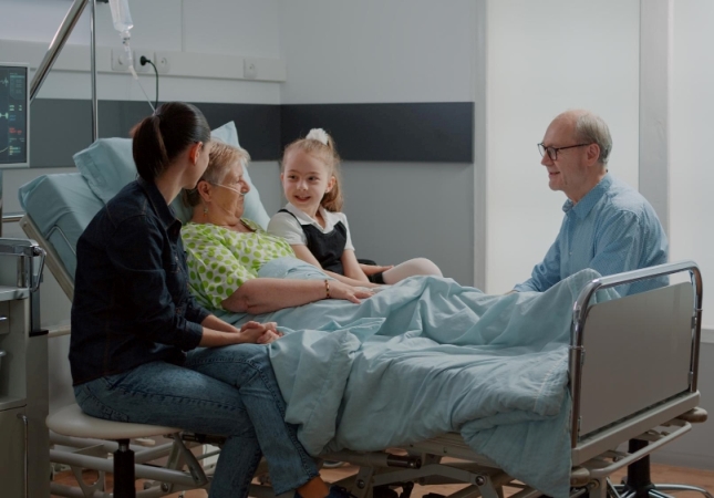 niece-hugging-sick-woman-family-visit-hospital-ward-child-mother-visiting-retired-patient-with-disease-hospitalized-person-enjoying-chat-with-young-girl-helping-with-recovery