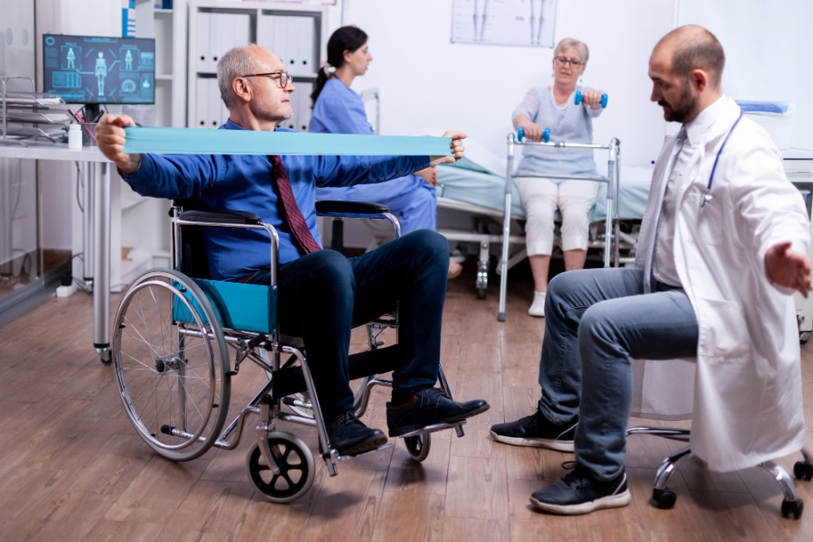 senior-man-wheelchair-exercising-muscle-strength