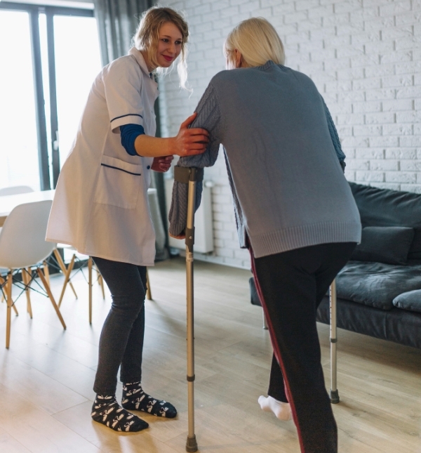 woman-walking-with-nurse-retirement-home